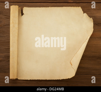 parchment scroll on wood background Stock Photo