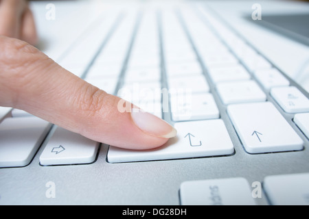 woman laptop finger indoor desk Stock Photo