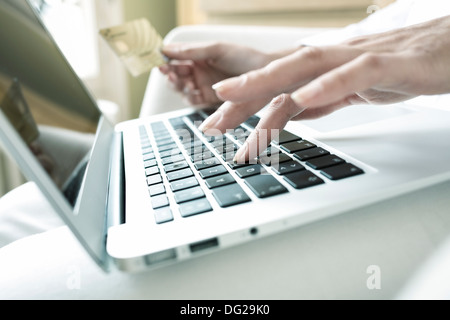 Female laptop finger table desk indoor Stock Photo