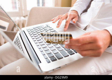 Female laptop finger table desk indoor Stock Photo