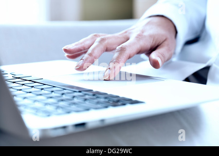 woman computer finger keyboard desk Stock Photo