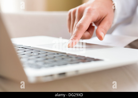 woman computer finger keyboard desk Stock Photo