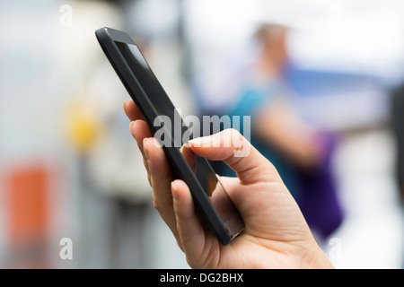 Female mobile train phone tgv message sms Stock Photo