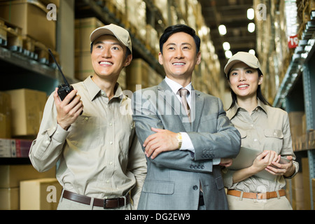 Young logistics team in warehouse Stock Photo