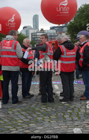 Liverpool, England, UK. Saturday 12th October 2013. Stewards at the march from  Unite the Union. Around 7000 people marched through Liverpool city centre for a march against fascism organised by Unite the Union. As part of a national day of protest, trade unions and anti-racism groups led the rally through the city centre. A major focus of the event was a message that far-right BNP (British National Party) leader Nick Griffin must be defeated at the Euro elections next year. Stock Photo