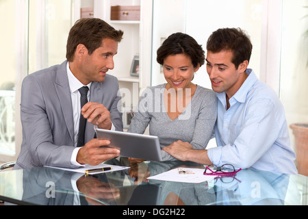 tablet pc woman man businessman indoor contrat Stock Photo