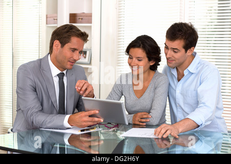 woman man businessman tablet pc indoor contrat Stock Photo