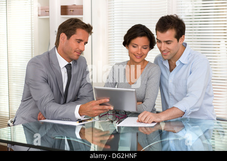 woman man businessman tablet pc indoor contrat Stock Photo