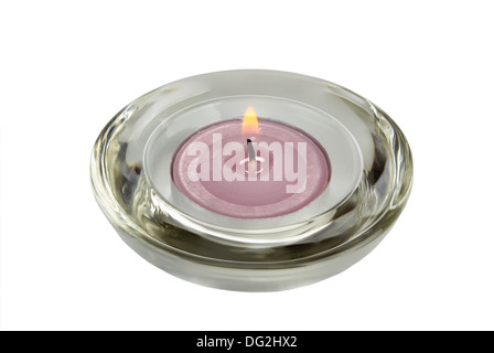 A candle in a glass holder.Isolated on white. Stock Photo
