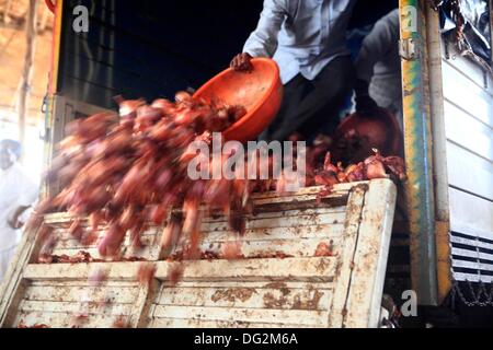 Lasalgaon, Maharashtra, India. 26th Sep, 2013. A Onion trader unloads the stock at his warehouse after he bought the onions at the auction at the Lasalgaon Onion Market. The current supply is reportedly about 1/10 the regular volume leading to huge increase in the price of onions in India. In India the onion prices have more than tripled this year 2013. Onions have become a surprisingly sensitive topic in the country, considered a everyday dietary staple. Inflation data showed that wholesale onion prices shot up 245 per cent in August. (Credit Image: © Subhash Sharma/ZUMA Wire/ZUMAPRESS Stock Photo