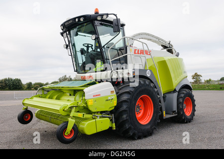 Claas 960 Jaguar forage harvester with 300 Pick Up head Stock Photo