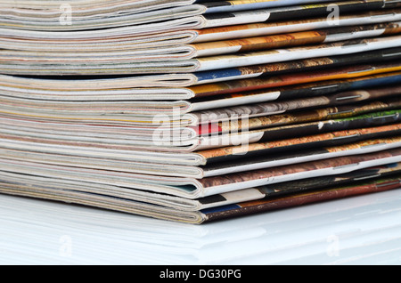 Stack of old colored magazines close-up. Stock Photo