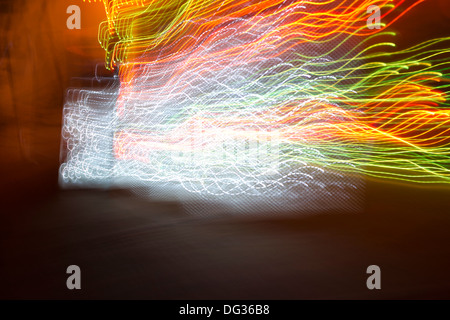 Star shaped xmas lights crashing and exploding Stock Photo