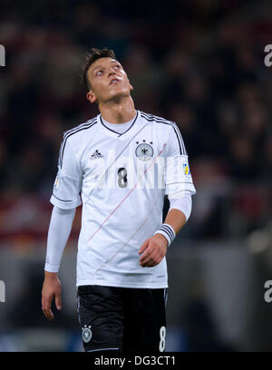 Cologne, Germany. 11th Oct, 2013. Germany's Mezut Ozil reacts during the soccer match between Germany and Ireland at the World Cup qualification in the RheinEnergieStadion in Cologne, Germany, 11 October 2013. Photo: Thomas Eisenhuth/dpa/Alamy Live News Stock Photo