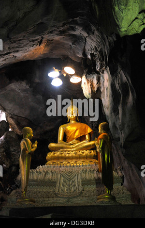 Wat Khao Yoi a buddhist cave temple in Petchaburi province near to Cha Am in Thailand. Stock Photo