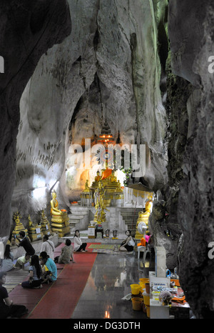 Inside a cavern at the buddhist cave temple Wat Khao Yoi in Petchaburi province near to Cha Am in Thailand. Stock Photo