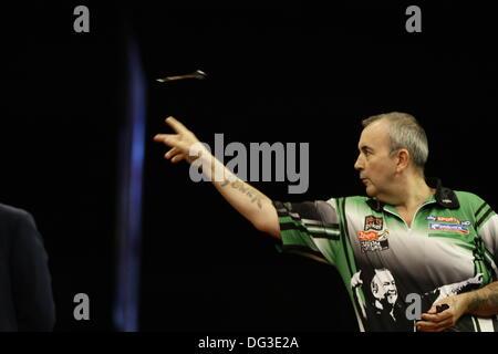 Dublin, Irl. 13th Oct, 2013. Dublin, UK. 13th Oct, 2013. PDC Party Poker World Grand Prix  Darts  -The Final: Phil Taylor in action against Dave Chisnall at the Cirtwest Hotel, Dublin, Ireland © Michael Cullen/Alamy Live News Credit:  Michael Cullen/Alamy Live News Stock Photo