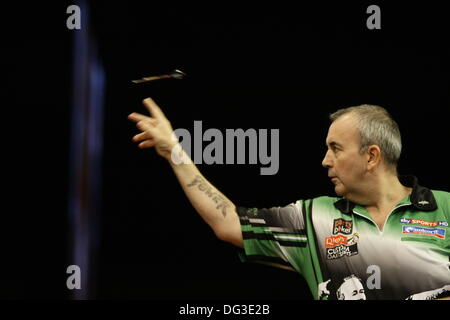 Dublin, Irl. 13th Oct, 2013. Dublin, UK. 13th Oct, 2013. PDC Party Poker World Grand Prix  Darts  -The Final: Phil Taylor in action against Dave Chisnall at the Cirtwest Hotel, Dublin, Ireland © Michael Cullen/Alamy Live News Credit:  Michael Cullen/Alamy Live News Stock Photo