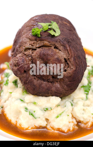 Stewed beef roulade with parsley and mashed celeriac Stock Photo