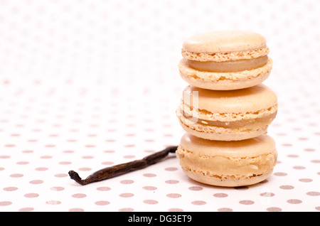 Stack of three macarons with flavour of vanilla Stock Photo