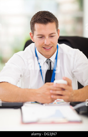 handsome businessman using smart phone Stock Photo