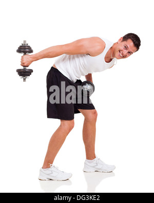 handsome young man using dumbbells isolated on white background Stock Photo