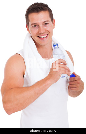 happy young man drinking water after workout over white background Stock Photo