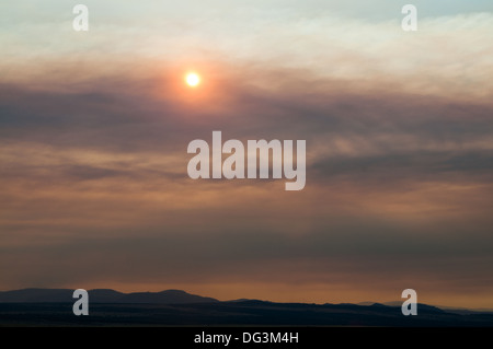 Smoke filled sky in eastern Oregon, from a forest fire burning out of control. Stock Photo