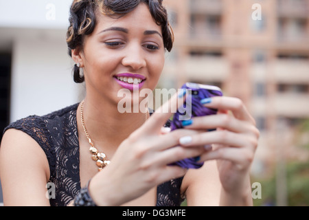 Woman using smart phone - USA Stock Photo