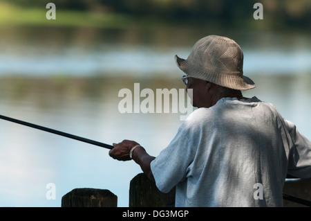 Portrait woman fishing pole on hi-res stock photography and images - Alamy