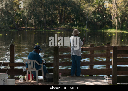 Black woman fishing for Mullet on the St. Johns River in Central Florida  USA Stock Photo - Alamy