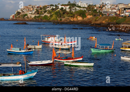 Fishing boats at sea during Lemanja festival on Rio Vermelho beach, Salvador, Bahia, Brazil, South America Stock Photo