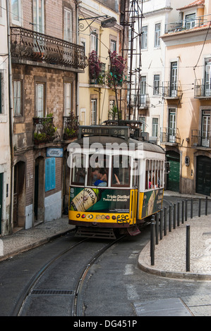 Famous tram 28 going through the old quarter of Bario Alto, Lisbon, Portugal, Europe Stock Photo