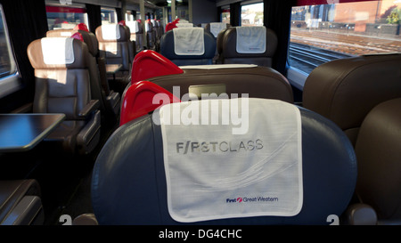 Empty First Class carriage, sign and seats on a Great Western Train departing Paddington Railway Station in London England UK KATHY DEWITT Stock Photo