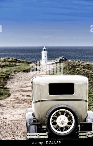 Vintage Ford car parked near Godrevy Lighthouse, Cornwall, England Stock Photo