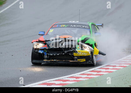 Brands Hatch, Kent, UK. 13th Oct, 2013. Damage to Nick Foster's BMW 125i M Sport after and unavoidable crash with eBay Motor's team mate Colin Turkington during race 1 of the final day of the Dunlop British Touring Car Championships from the Brands Hatch track. Credit:  Action Plus Sports/Alamy Live News Stock Photo