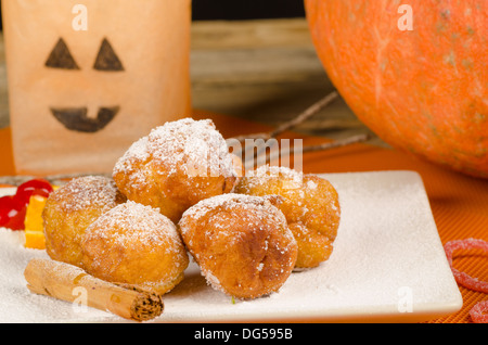 A traditional Spanish Halloween dessert served with holiday decoration. Stock Photo