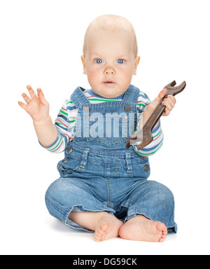 Small cute baby boy worker in jeans. Isolated on white background Stock Photo