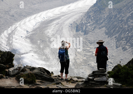 A trekker looking down on the Mer de Glace from Signal Forbes, Chamonix, France Stock Photo