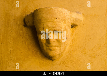 Stone face on a wall of Hampton Court Kings Lynn Norfolk Stock Photo
