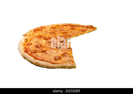 Large pizza with a slice missing, cut out with a white background. Stock Photo