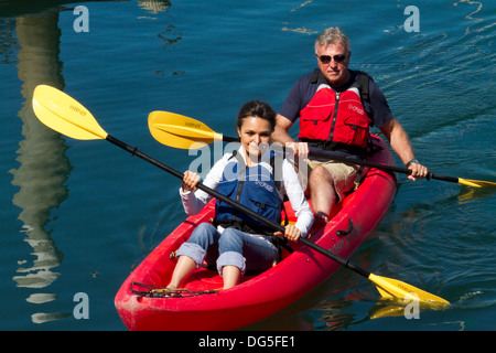 Couple kayaking in Santa Barbara harbor Stock Photo