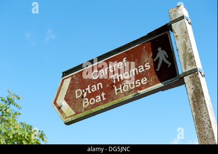 View of a sign, poining to the boathouse in the town of Laugharne, the Birthplace of the Poet Dylan Thomas, Wales UK Stock Photo