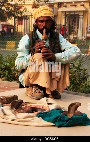 Snake charmer in the streets of New Delhi, India Stock Photo
