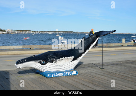 Whale sculpture on the waterfront wharf at scenic Provincetown harbor Cape Cod Massachusetts USA. Stock Photo