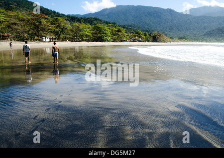 People at Castelhanos Beach, Ilhabela, Sao Paulo state shore, Brazil Stock Photo