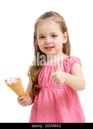 happy kid girl eating ice cream and showing thumb up Stock Photo