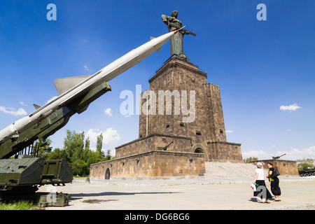 Rocket missile, Mother Armenia statue and military museum at Victory Park, Yerevan, Armenia Stock Photo