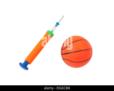 manual air pump with toy ball isolated on white background Stock Photo