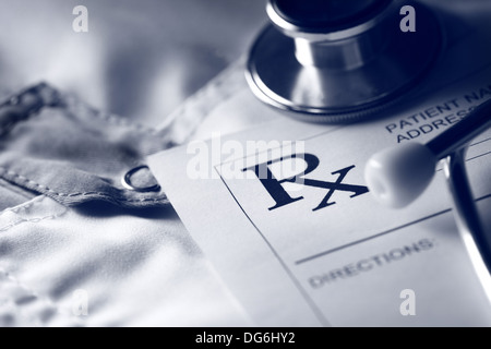 Stethoscope and patient list on doctor's smock Stock Photo